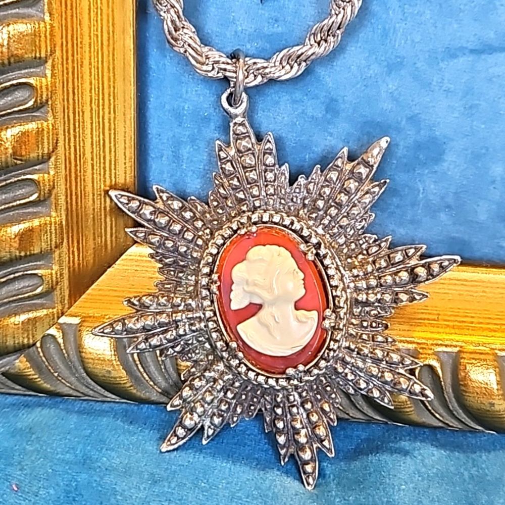 Vintage 1960s silver tone necklace with bakelite cameo.
